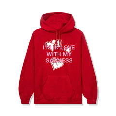 Red cotton hoodie. White heart with Anti Social Social Club Design in pink lettering, large front design.
